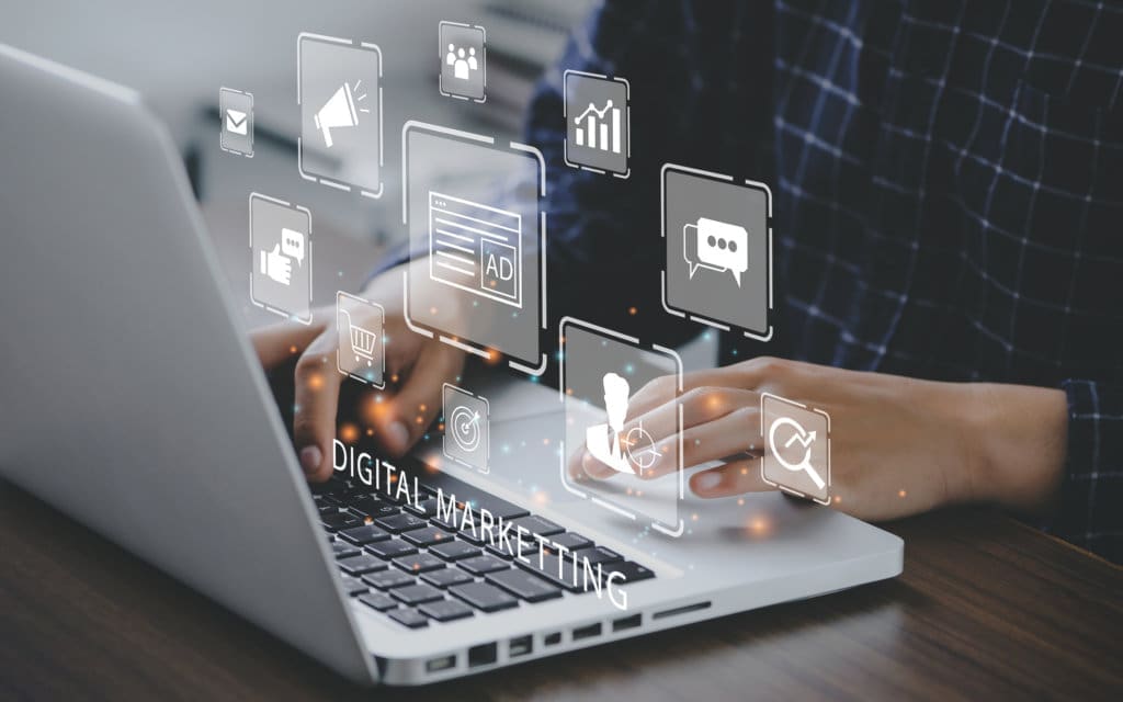 Marketer using a computer for digital online marketing